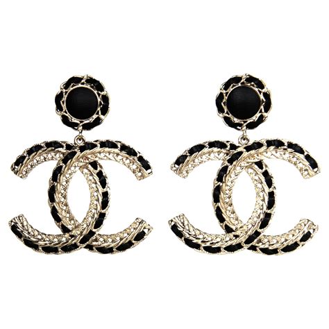 black and gold chanel cc earrings|Chanel earrings with black pearl.